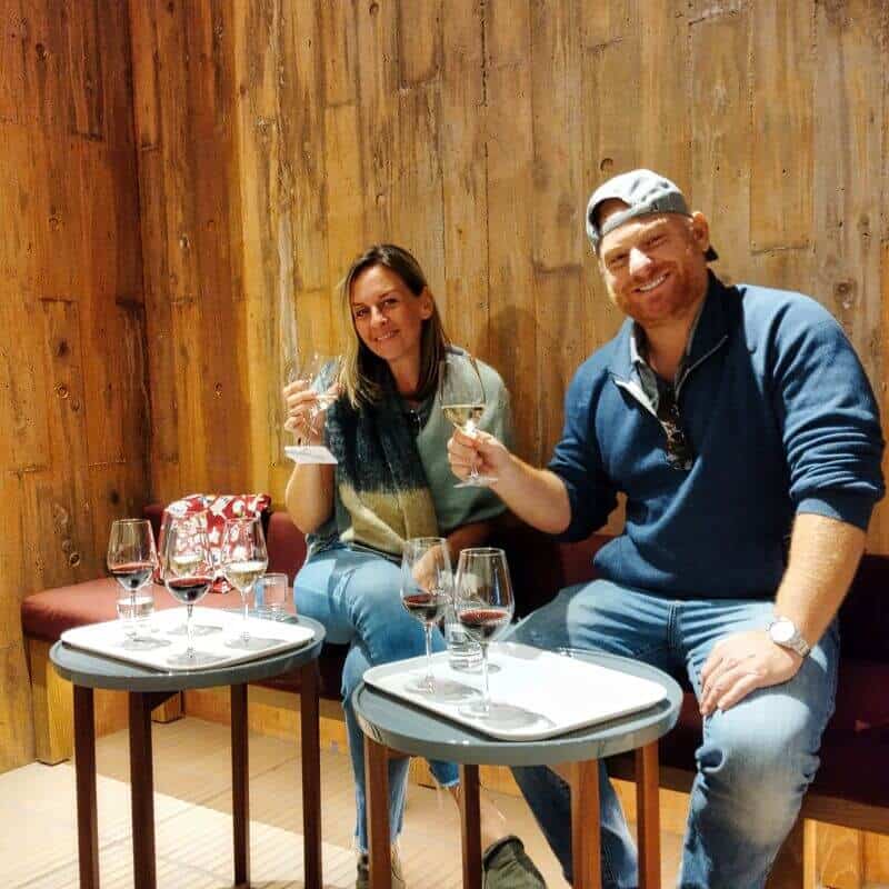 Guests enjoying a wine tasting session at a Yamanashi winery.