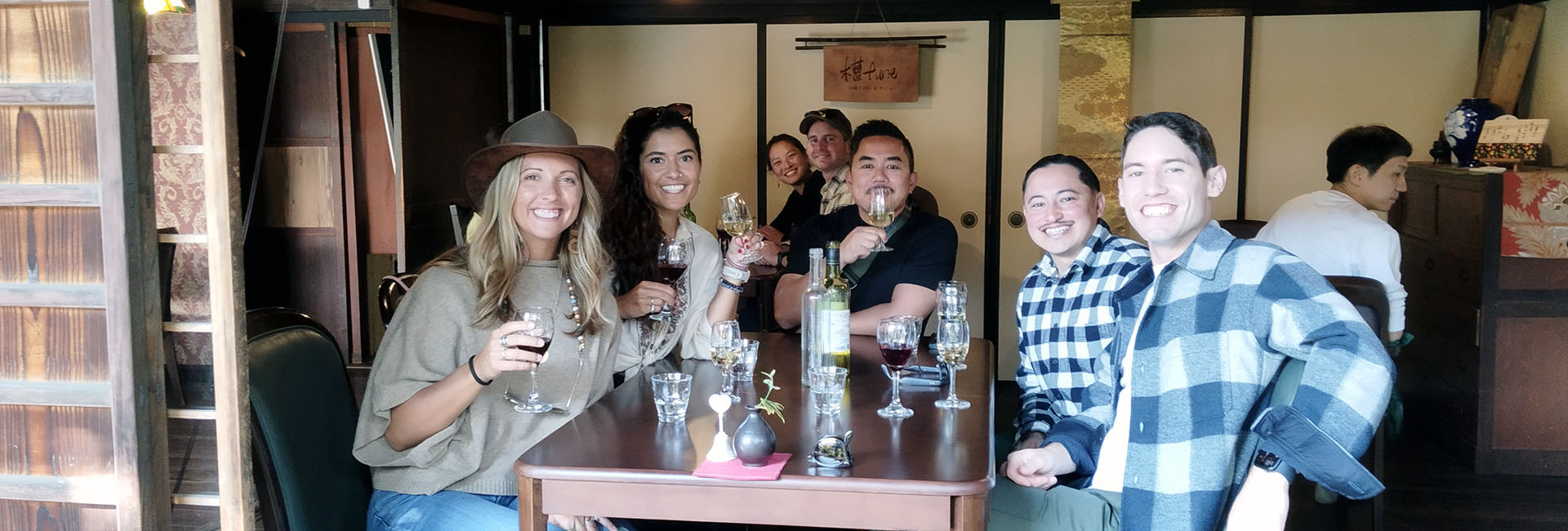 Happy customers tasting Koshu wine with Winery Tours Japan Yamanashi wine tasting and winery tour.