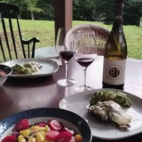 Wine pork–stuffed portobello mushrooms with salad and MGVs Muscat Bailey A wine in Yamanashi